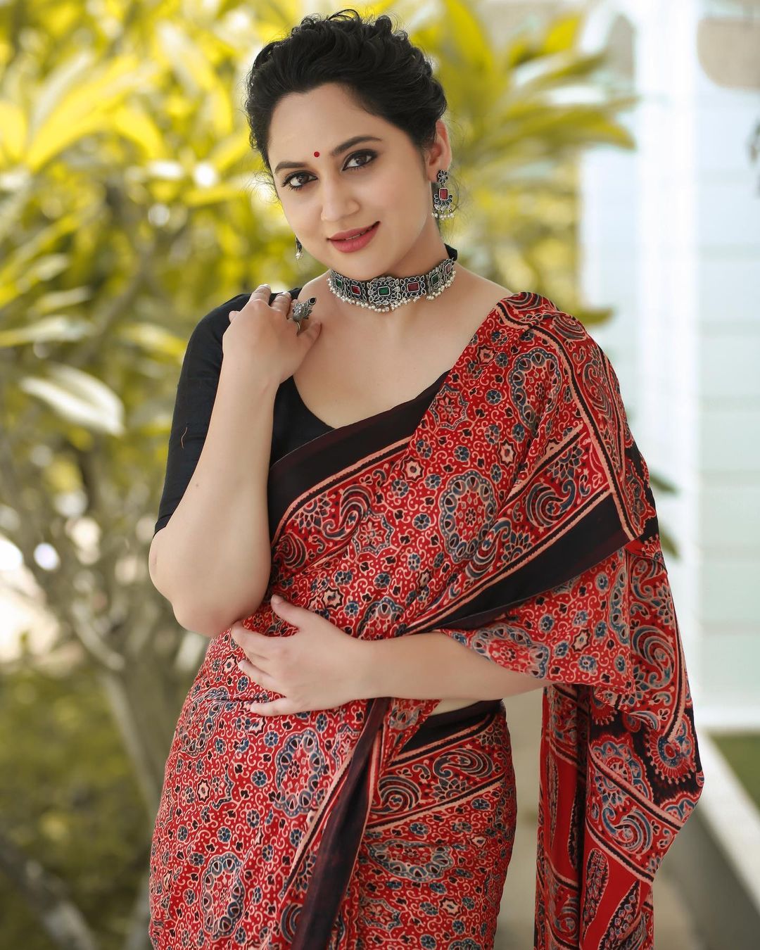 Malayalam Actress Miya George Images in Maroon Saree Black Blouse